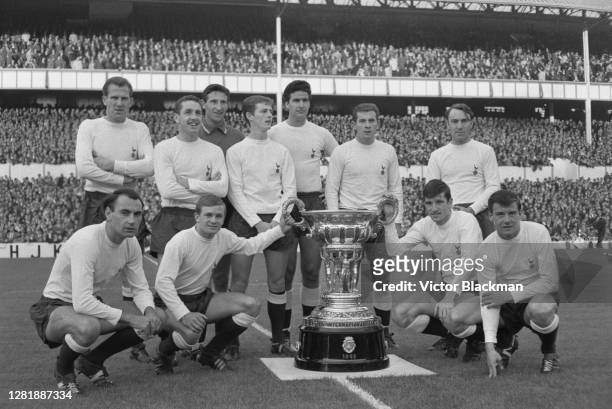 The Tottenham Hotspur team with the Trofeo Costa del Sol, August 1965. From left to right Alan Gilzean, Derek Possee, Eddie Clayton and Cyril...