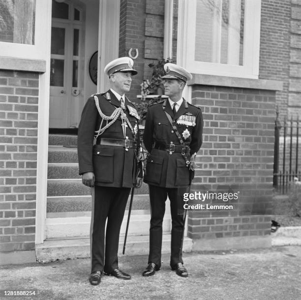 Louis Mountbatten , Earl Mountbatten, and his nephew Prince Philip, the Duke of Edinburgh at a Royal Marines ceremony at Eastney in Hampshire, UK,...