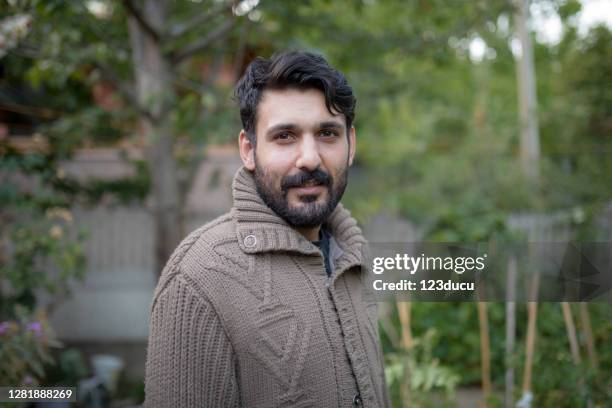 portrait of middle eastern man - syria refugee stock pictures, royalty-free photos & images