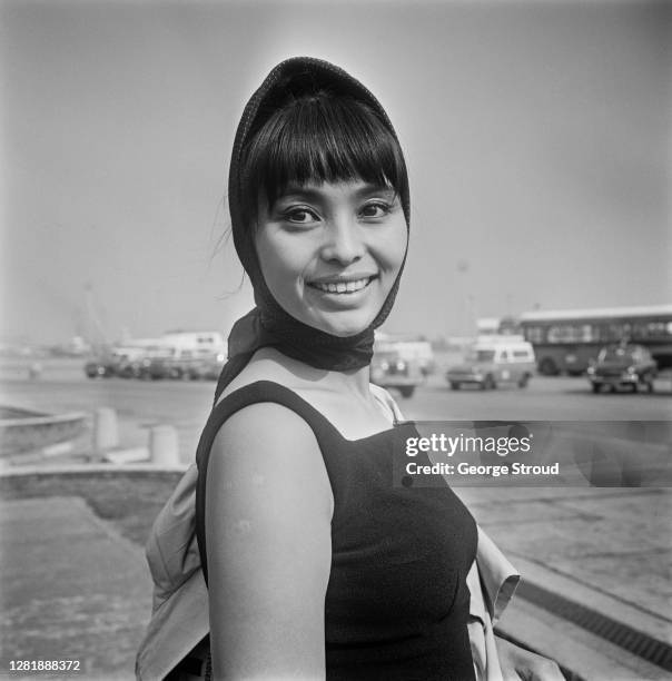 Japanese actress Akiko Wakabayashi arrives at London Airport, UK, 20th September 1966. She is set to star in the James Bond film 'You Only Live...