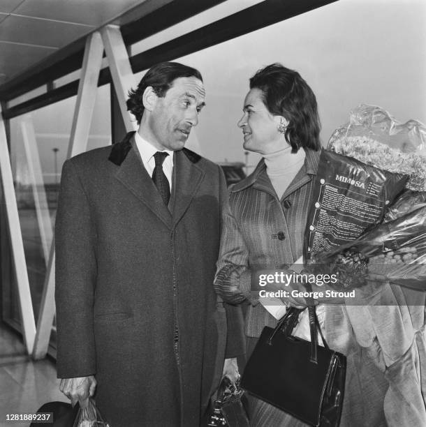 British politician Jeremy Thorpe , the Leader of the Liberal Party, at London Airport with his wife, pianist Marion Stein , after their honeymoon,...