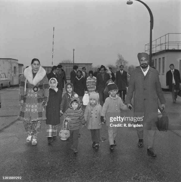 Mr Darshan Singh and his family leave Northolt Airport in the UK for West Germany, where they have been promised jobs and homes, 23rd January 1973....