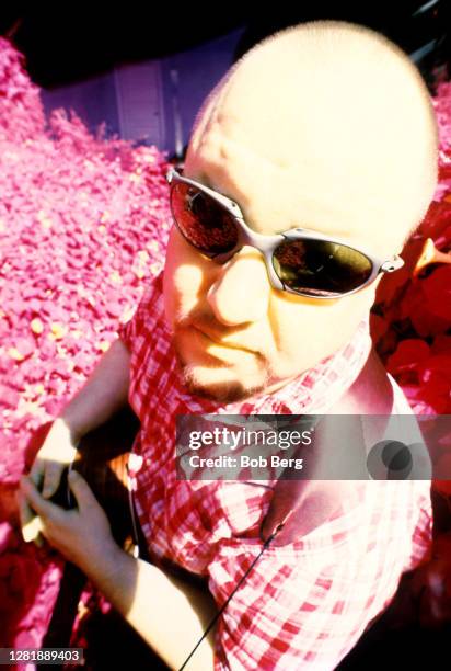 American singer, songwriter, and guitarist Frank Black, aka Black Francis, poses for a portrait with his guitar circa June, 1998 in Los Angeles,...