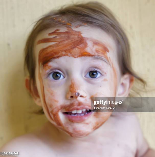 little child painting his own body. - hot body girls stock pictures, royalty-free photos & images