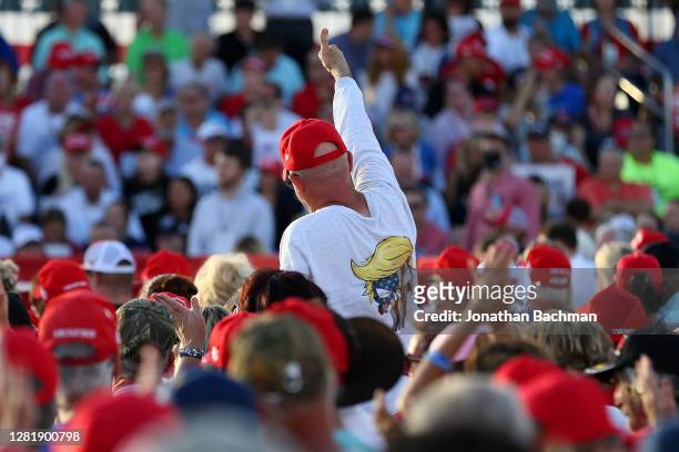 Supporter cheers during a rally for President Donald Trump on October 23, 2020 in Pensacola, Florida. With less than two weeks before the general...