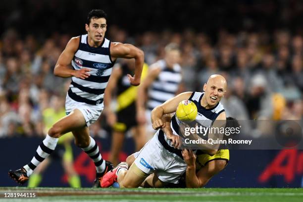 Gary Ablett of the Cats is tackled by Trent Cotchin of the Tigers during the 2020 AFL Grand Final match between the Richmond Tigers and the Geelong...