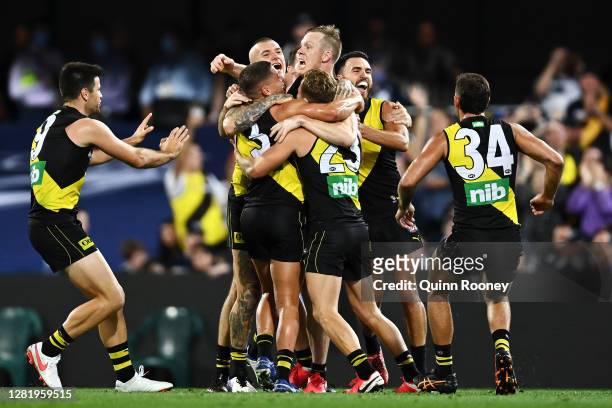Jack Riewoldt of the Tigers celebrates kicking a goal with team mates during the 2020 AFL Grand Final match between the Richmond Tigers and the...
