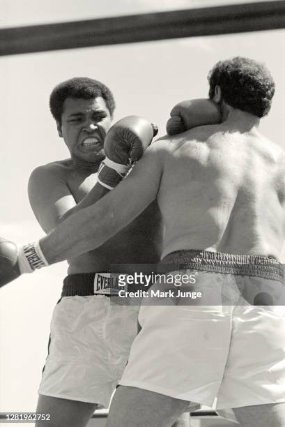Lyle Alzado , attempts to lock up Muhammad Ali during an eight-round exhibition match at Mile High Stadium on July 14, 1979 in Denver, Colorado....
