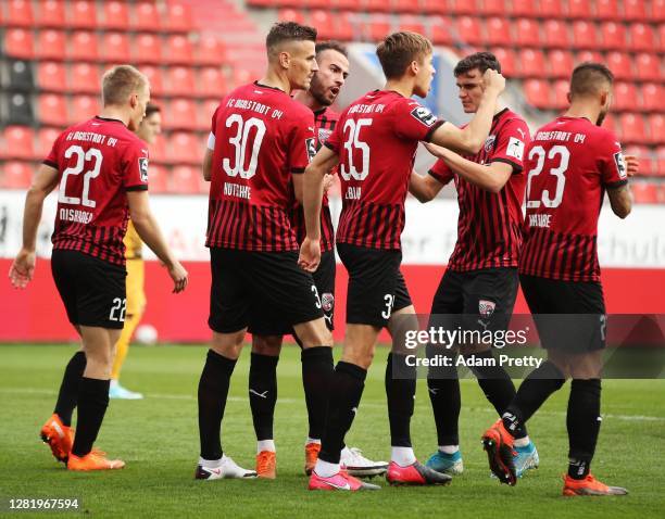 Ilmari Niskannen of FC Ingolstadt 04 is congratuklated after scoring a penalty goal during the 3. Liga match between FC Ingolstadt and Dynamo Dresden...