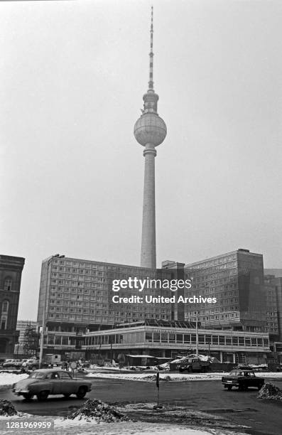 Buildings near Haus des Lehrers building at Alexanderplatz square an TV tower in the Eastern part of Berlin, Germany 1970.