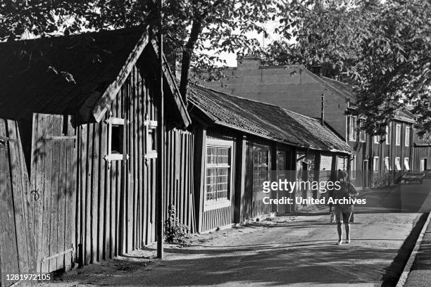 Visiting Arboga, traditional farmhouses at Ahlloefsgatan, South of Sweden, 1969.