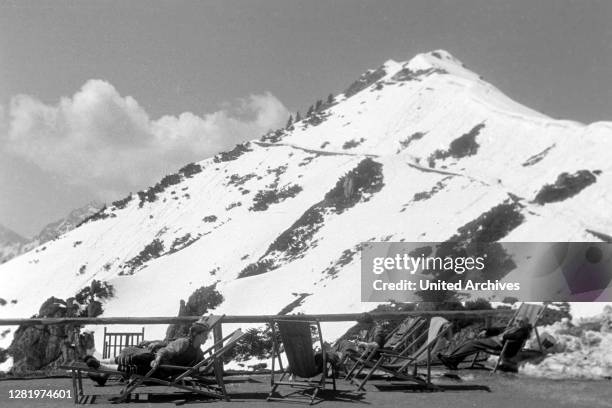 Sunbathing near Jenner summit, 1957.