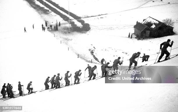 Winter Olympics 1936 - Germany, Third Reich - Olympic Winter Games, Winter Olympics 1936 in Garmisch-Partenkirchen. Ski Alpine - climb to the...