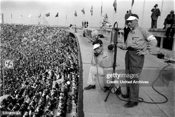 Summer Olympics 1936 - Germany, Third Reich - Olympic Games, Summer Olympics 1936 in Berlin. Sports reporter at the Olympic stadium. Image date...