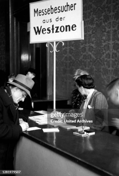 Germany - Leipzig Exhibition Center 1949. Visitors from the western zone. Desk for visitors from Western Gemany at Leipzig.
