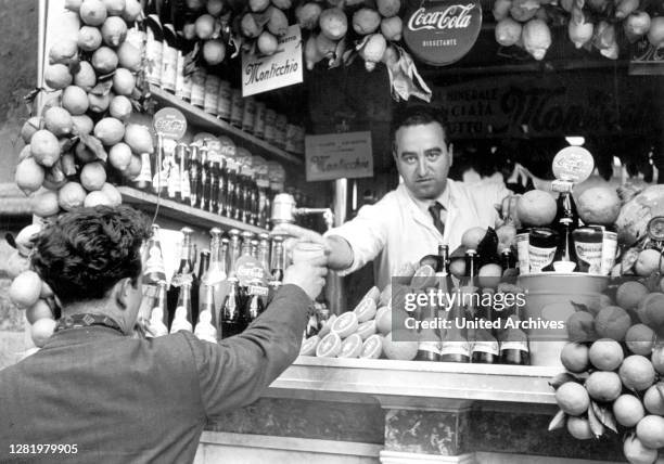 Travel to Naples - Italy in 1950s. Kiosk in Naples. Pump room in Naples, Italy. Image taken 1954 by Erich Andres.