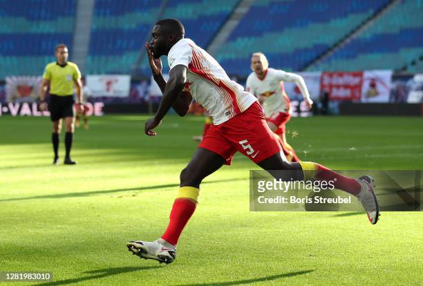 Dayot Upamecano of RB Leipzig celebrates after scoring his team's first goal during the Bundesliga match between RB Leipzig and Hertha BSC at Red...