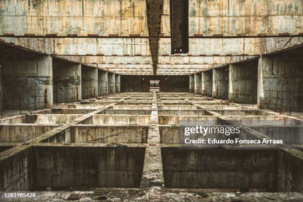 structure of the dâmbovița center (also named casa radio), an abandoned and unfinished building in downtown bucharest - romanian ruins stock pictures, royalty-free photos & images