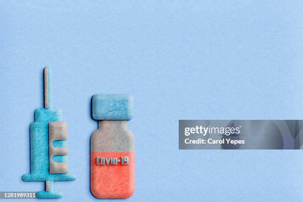 covid vaccine and syringe in felt with copyspace - diphtheria stock pictures, royalty-free photos & images