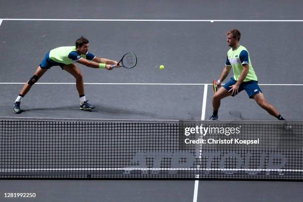 Andreas Mies of Germany plays a backhandk during the double semi final match between Marcus Daniell of New Zealand and Philipp Oswald of Austria and...