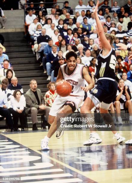 UConn's Nykesha Sales drives the baseline vs Notre Dame, Storrs CT, 1997.