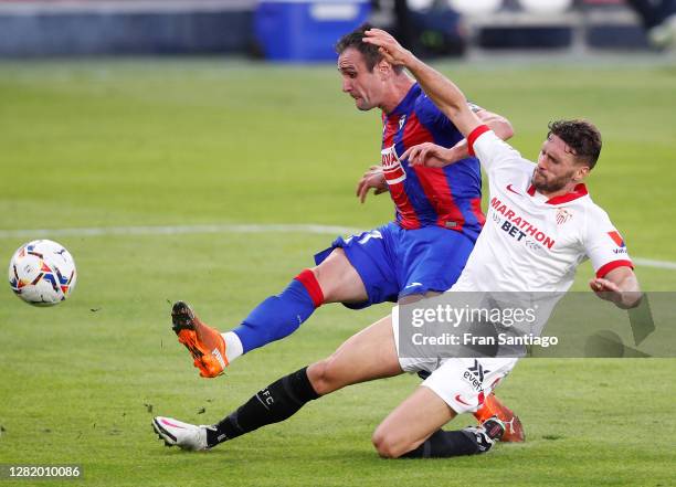 Kike of SD Eibar scores his team's first goal during the La Liga Santander match between Sevilla FC and SD Eibar at Estadio Ramon Sanchez Pizjuan on...