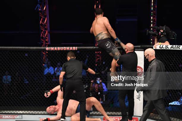 Tai Tuivasa of Australia celebrates his KO victory over Stefan Struve of The Netherlands in their heavyweight bout during the UFC 254 event on...