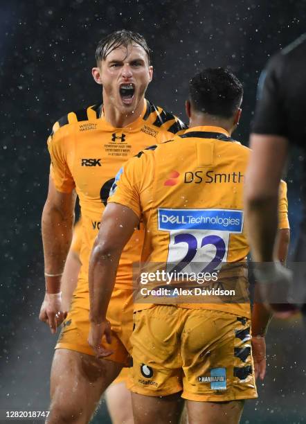 Josh Bassett of Wasps and Lima Sopoaga of Wasps celebrate a penalty during the Gallagher Premiership Rugby final match between Exeter Chiefs and...