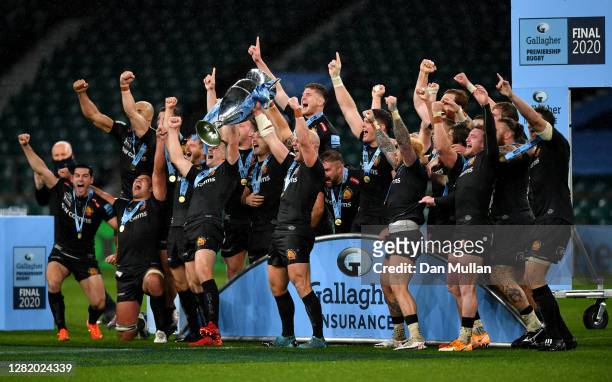 Exeter Chiefs players celebrate with the Gallagher Premiership Trophy following their team's victory in the Gallagher Premiership Rugby final match...