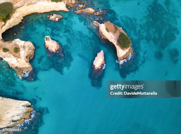 faraglioni of st. andrew from above - isle of capri sunset stock pictures, royalty-free photos & images