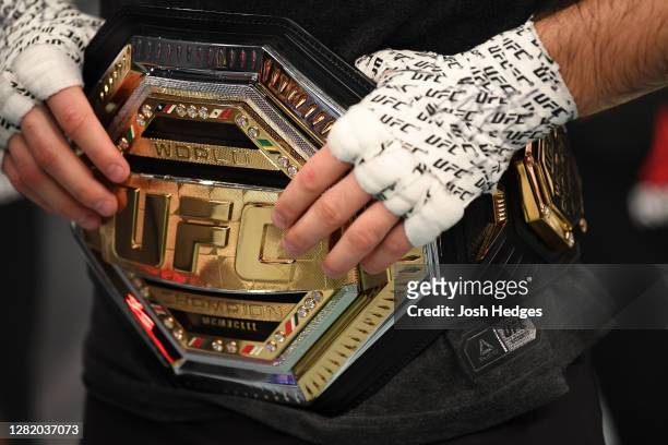 Detail shot of Khabib Nurmagomedov's belt after he announces his retirement in the Octagon after his victory over Justin Gaethje in their lightweight...