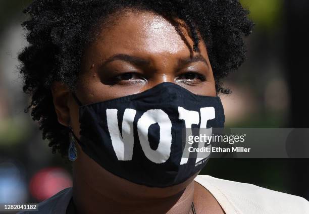 Former Georgia gubernatorial candidate Stacey Abrams waits to speak at a Democratic canvass kickoff as she campaigns for Joe Biden and Kamala Harris...
