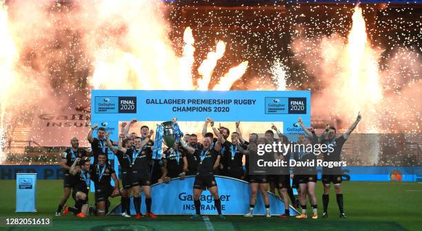 Joe Simmonds and Jack Yeandle, the co captains of Exeter Chiefs, raise the Premiership trophy after their victory during the Gallagher Premiership...