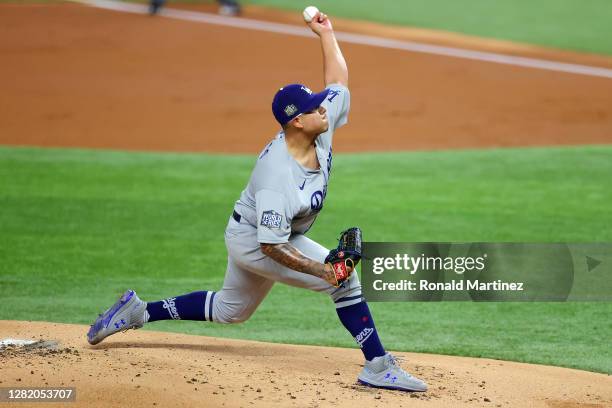 Julio Urias of the Los Angeles Dodgers delivers the pitch against the Tampa Bay Rays during the first inning in Game Four of the 2020 MLB World...