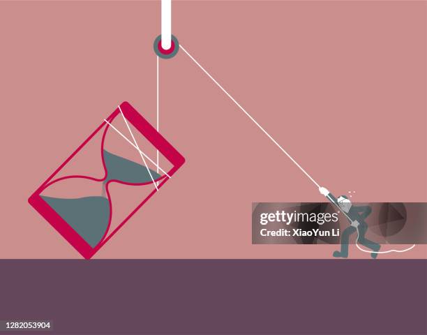 a man pulls up an hourglass and uses a pulley. - long time stock illustrations