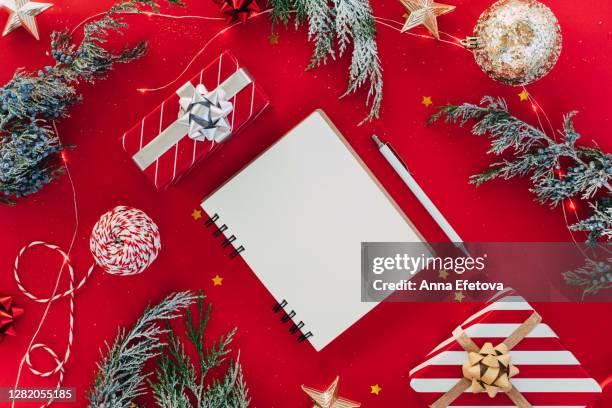 christmas goals list on christmas red background - gift lounge stock pictures, royalty-free photos & images