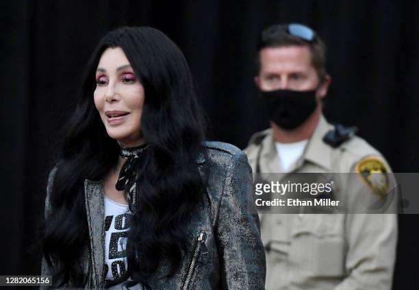 Singer/actress Cher arrives at a residential shopping center to campaign for Joe Biden and Kamala Harris at an early vote rally on October 24, 2020...