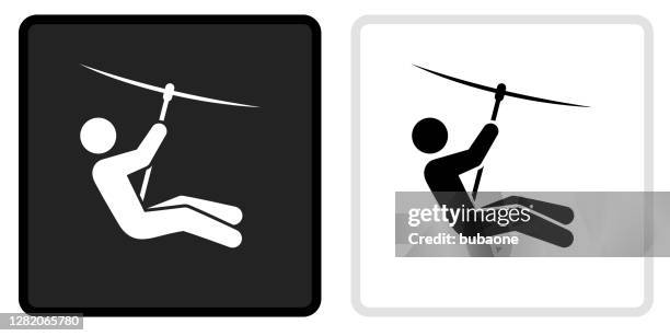 zip lining icon on  black button with white rollover - zip stock illustrations