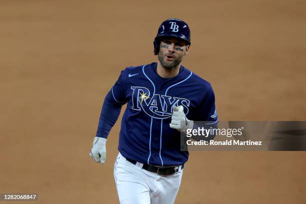 Kevin Kiermaier of the Tampa Bay Rays rounds the bases after hitting a solo home run against the Los Angeles Dodgers during the seventh inning in...