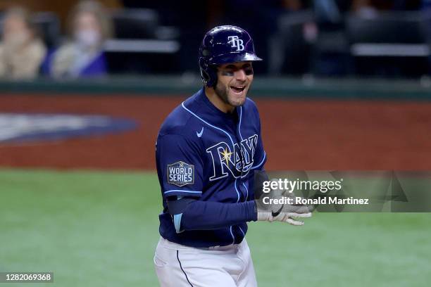 Kevin Kiermaier of the Tampa Bay Rays celebrates after hitting a solo home run against the Los Angeles Dodgers during the seventh inning in Game Four...