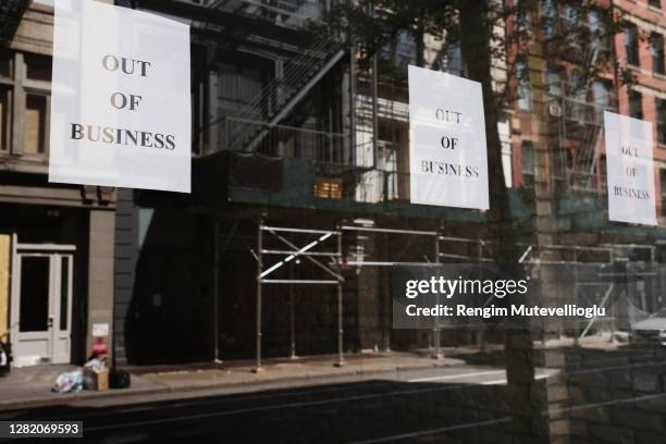 going out of business signs - chest or bust ストックフォトと画像