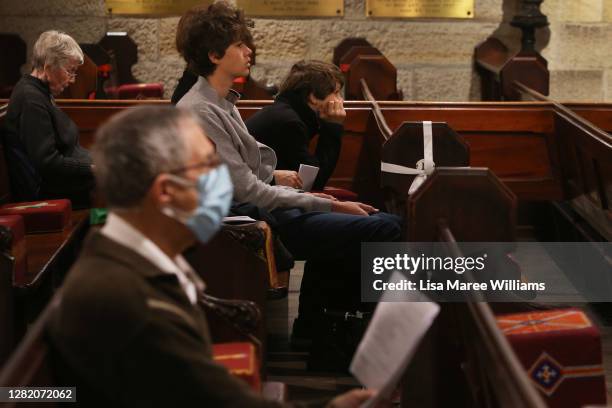 Parishioners attend the 'Twenty-First Sunday after Pentecost' service at St Paul's Anglican Church in Burwood on October 25, 2020 in Sydney,...