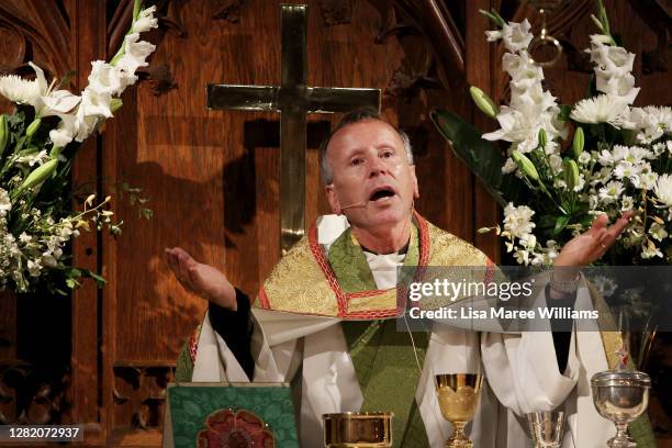 Father James Collins conducts the 'Twenty-First Sunday after Pentecost' service at St Paul's Anglican Church in Burwood on October 25, 2020 in...