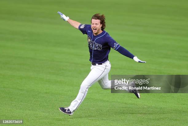 Brett Phillips of the Tampa Bay Rays celebrates after hitting a ninth inning two-run walk-off single to defeat the Los Angeles Dodgers 8-7 in Game...