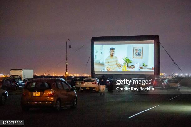 Viewers in their cars enjoy a film as NewFest hosts a drive-in screening of "Cicada" at Brooklyn Army Terminal on October 24, 2020 in New York City.