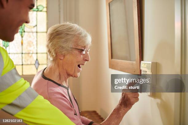 safe at home - burglar alarm stock pictures, royalty-free photos & images