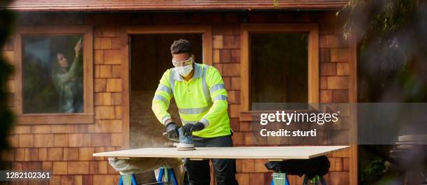 building the garden room - man shed stock pictures, royalty-free photos & images