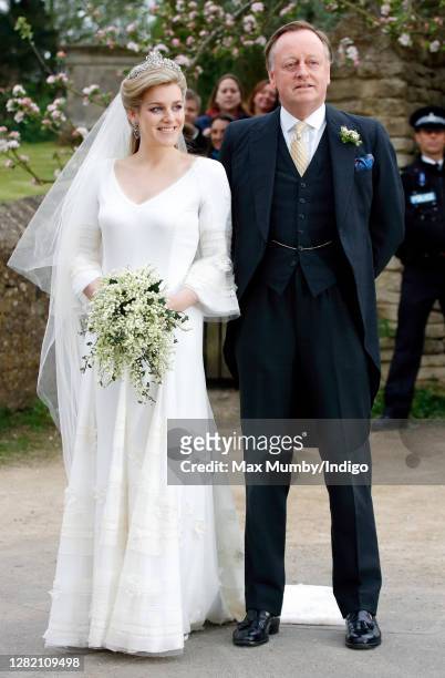 Laura Parker Bowles accompanied by her father Andrew Parker Bowles arrives for her wedding to Harry Lopes at St Cyriac's Church on May 6, 2006 in...