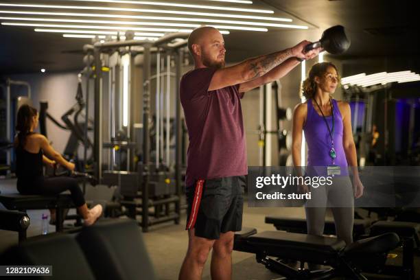 personal trainer - leisure facilities stock pictures, royalty-free photos & images