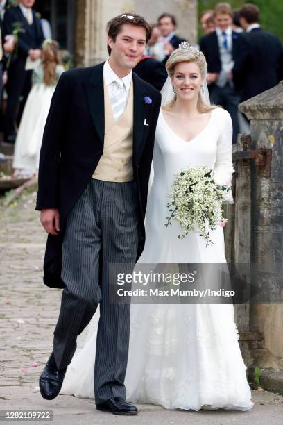 Harry Lopes and Laura Parker Bowles depart after their wedding at St Cyriac's Church on May 6, 2006 in Lacock, England.
